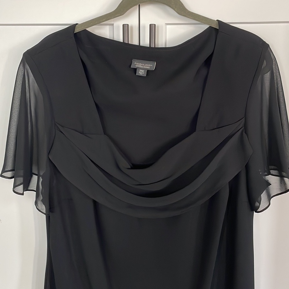 Black dress with sheer scoop neck